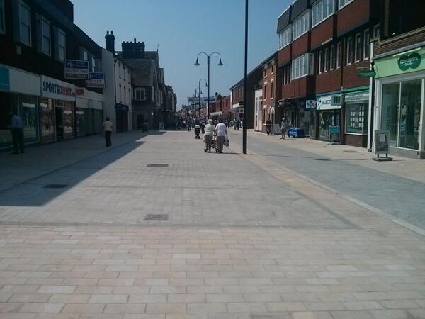 Bromsgrove high street looks good now. But how long before a utility digs it up or the council patch it with tarmac?  - embedded image