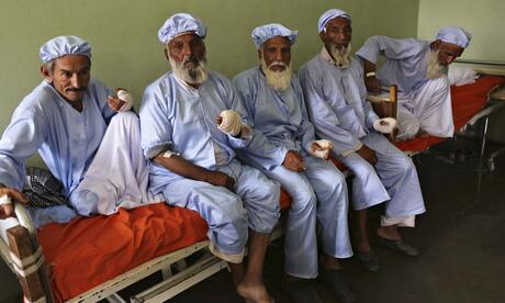 RT The men in this photo had their fingers cut off by the Taliban for voting http://t.co/Urve8rH7Rq @guardianworld  - embedded image