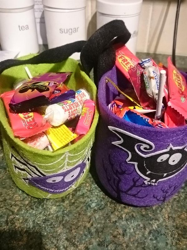 The residents of Pennine Road were very generous. Our buckets are full of sweets.  #trickortreat  - embedded image 