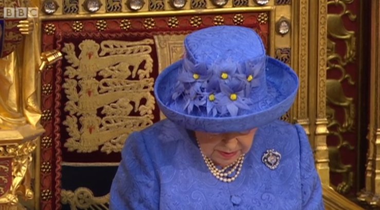 RT Not to be facetious but the Queen's hat looks like the European Union flag  - embedded image 1