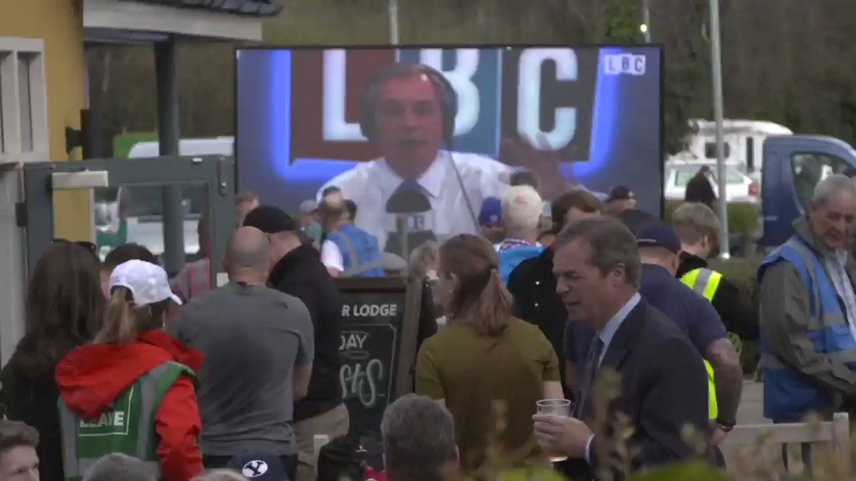 RT Farage trying to have a pint while we broadcast footage of him calling for a second referendum  - embedded image 